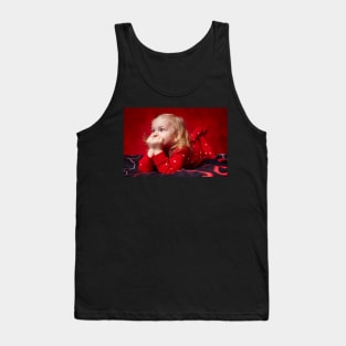 Pensive toddler girl laying in bed with hands on chin Tank Top